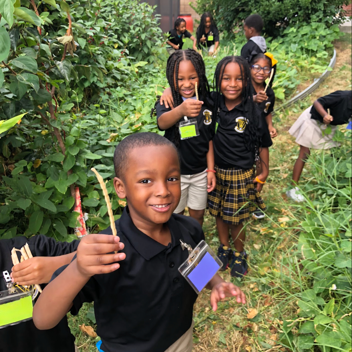 Students posing together and participating in school activities